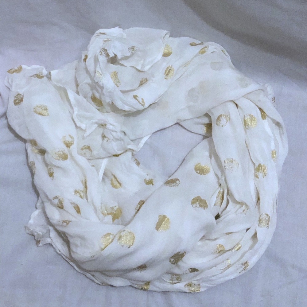 White scarf with gold polka dots